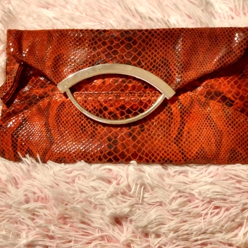 Bebe red snakeskin clutch with silver detail